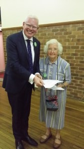 Lauris Buckman, Gerringong resident for 51 years, giving  a copy of her submission to  Gareth Ward MP. 